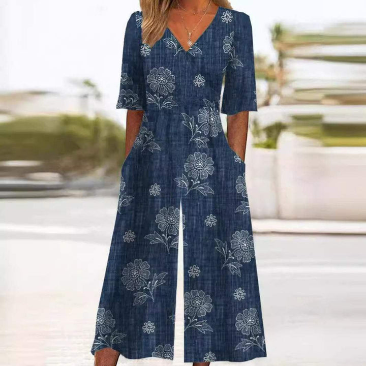 Emma | Kvinne Boho Blomstertrykk Jumpsuit V-hals Halv Ermer Lommer