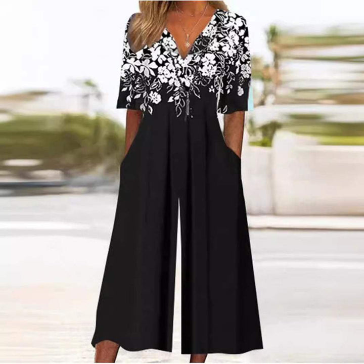 Emma | Kvinne Boho Blomstertrykk Jumpsuit V-hals Halv Ermer Lommer