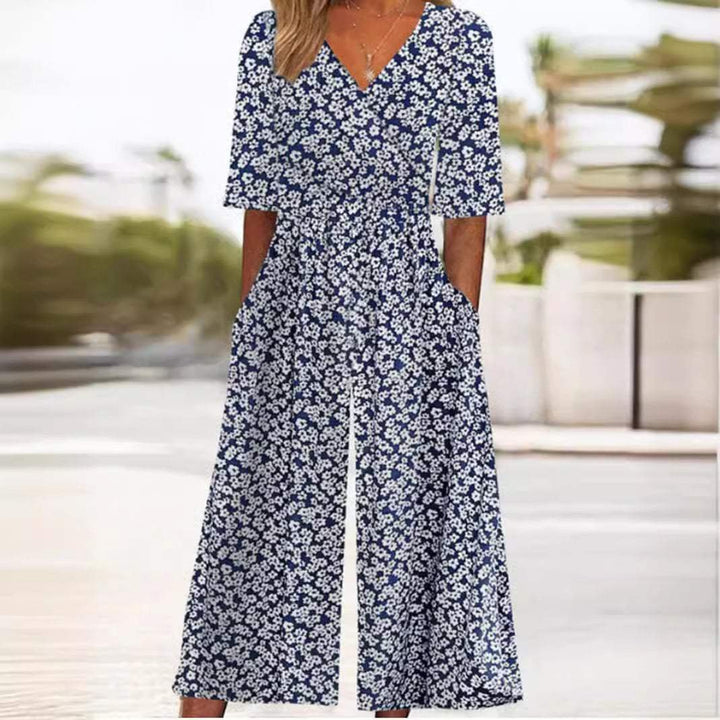 Emma | Kvinne Boho Blomstertrykk Jumpsuit V-hals Halv Ermer Lommer